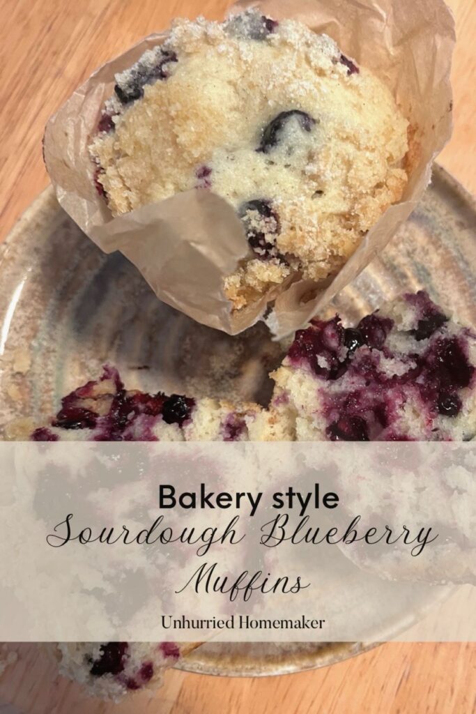 Bakery style sourdough blueberry muffins on a plate. unhurried homemaker.
