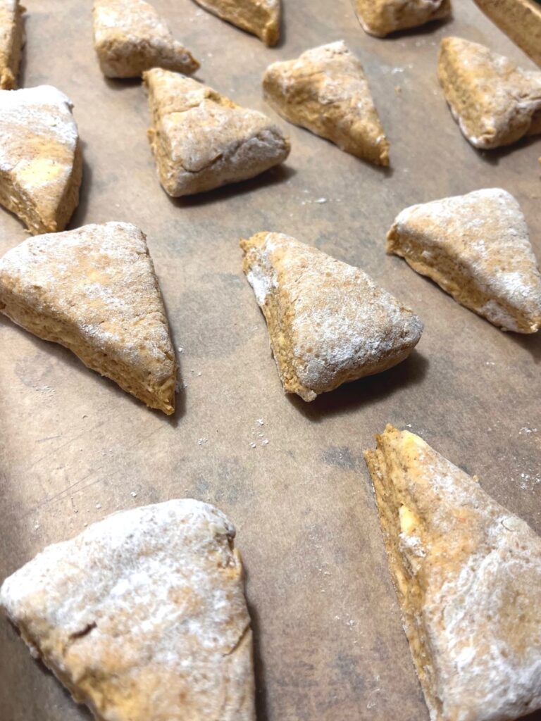 A tray of unbaked pumpkin sourdough scone dough.